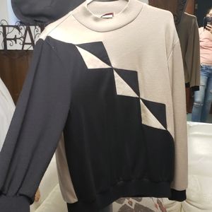 Men's tan and black sweater